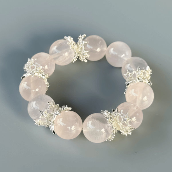 Rose quartz crystal bead bracelet with delicate silver spacers
