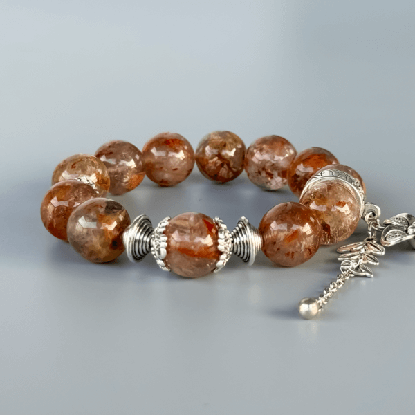 handmade ghost crystal bracelet with floral silver charm