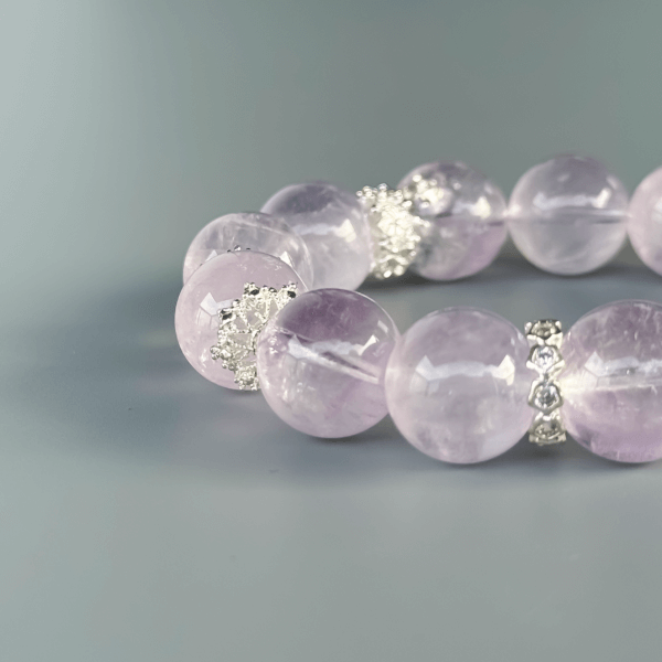 Light purple crystal bead bracelet with silver accents