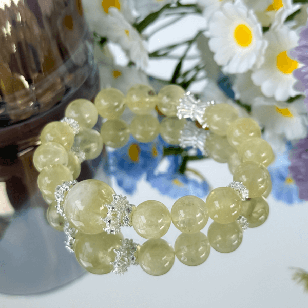 Yellow crystal bead bracelet with silver accents