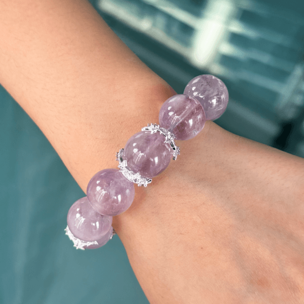Lavender Amethyst Crystal Bracelet worn on wrist