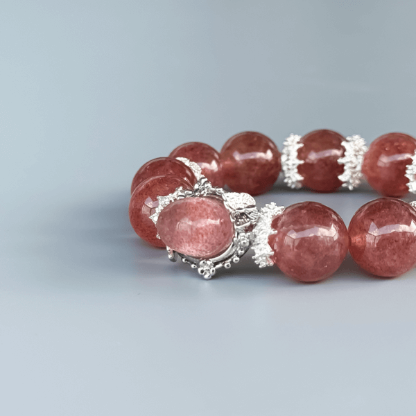 Strawberry Quartz bead bracelet with silver floral details