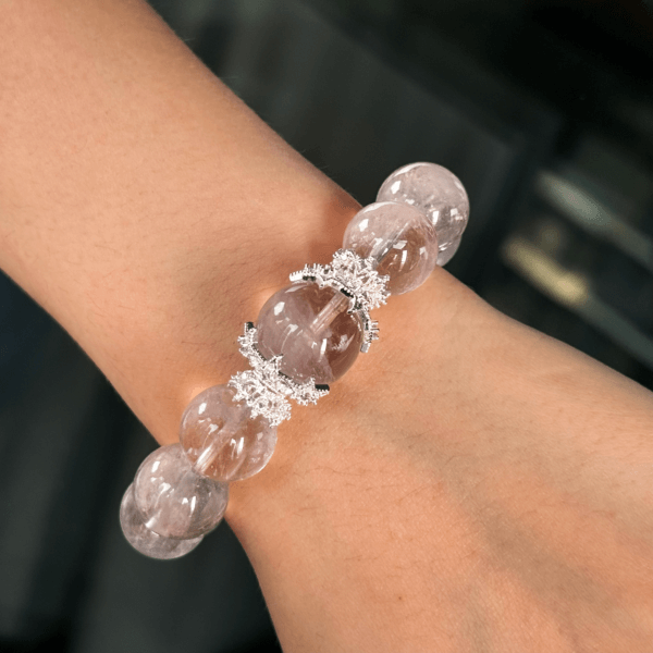 Gray Rabbit Hair crystal bracelet on wrist with silver accents
