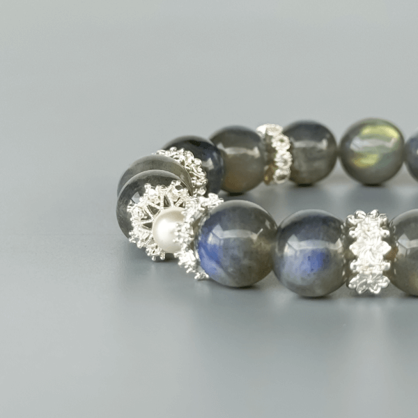 Labradorite crystal bead bracelet with pearl and silver accents.