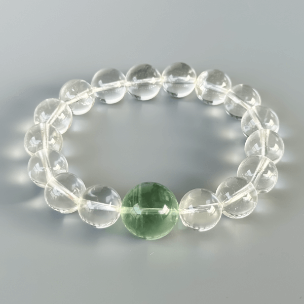 Clear Quartz bracelet with green crystal bead centerpiece
