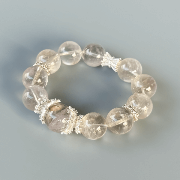 Close-up of Gray Rabbit Hair crystal bracelet beads with silver accents
