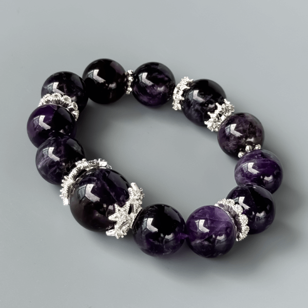 Uruguayan Amethyst crystal bead bracelet on light background