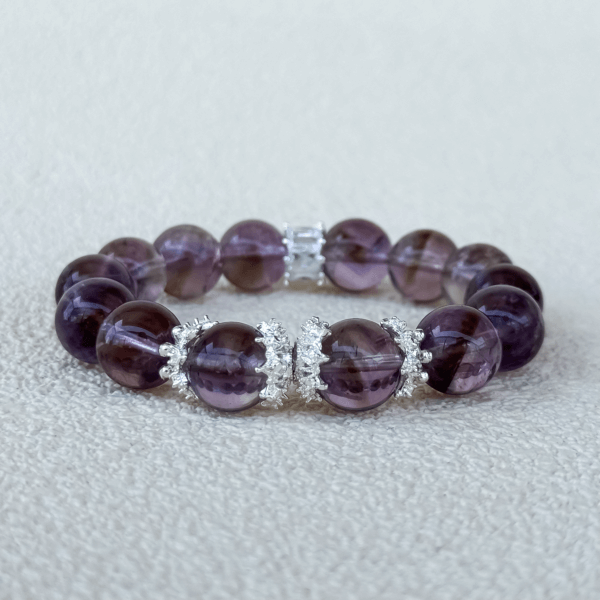 Lavender Amethyst crystal bracelet displayed flat