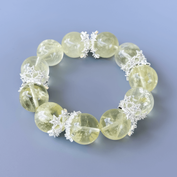 Yellow crystal bead bracelet with silver crown spacers