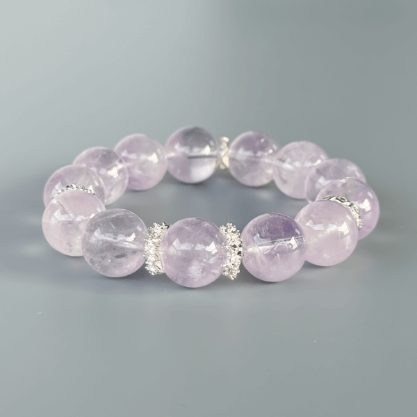 Light purple crystal bead bracelet with silver accents