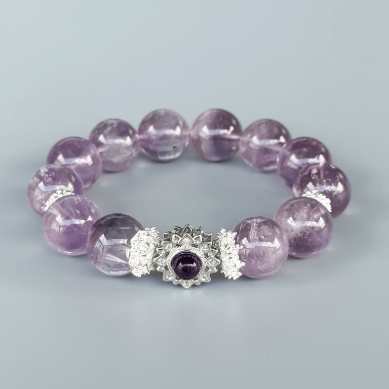 Icy Amethyst crystal bead bracelet with silver flower motif