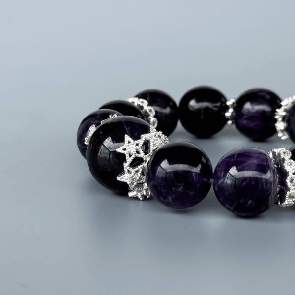 Uruguayan Amethyst crystal bead bracelet on light background