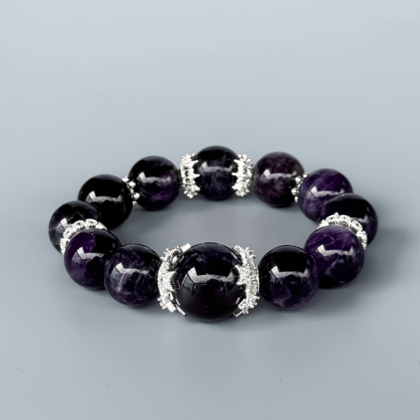 Uruguayan Amethyst crystal bead bracelet on light background