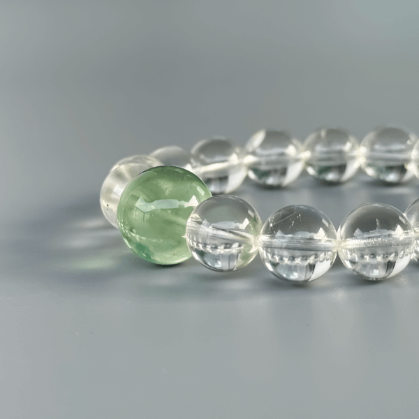 Clear Quartz bracelet with green crystal bead centerpiece