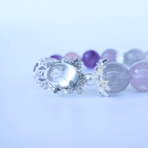 Super Seven Amethyst bead bracelet product display on white background