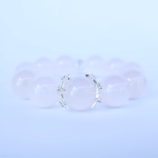 Light pink Madagascar Rose Quartz bracelet with crystal bead design