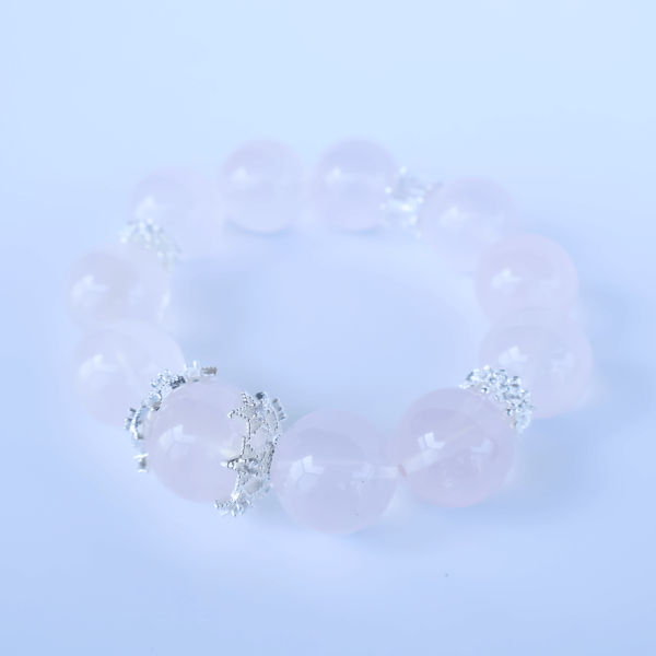 Light pink Madagascar Rose Quartz bracelet with crystal bead design