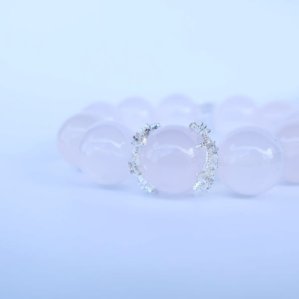 Light pink Madagascar Rose Quartz bracelet with crystal bead design