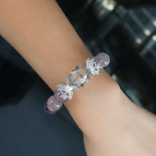 Super Seven Amethyst bracelet worn on wrist showing elegant design