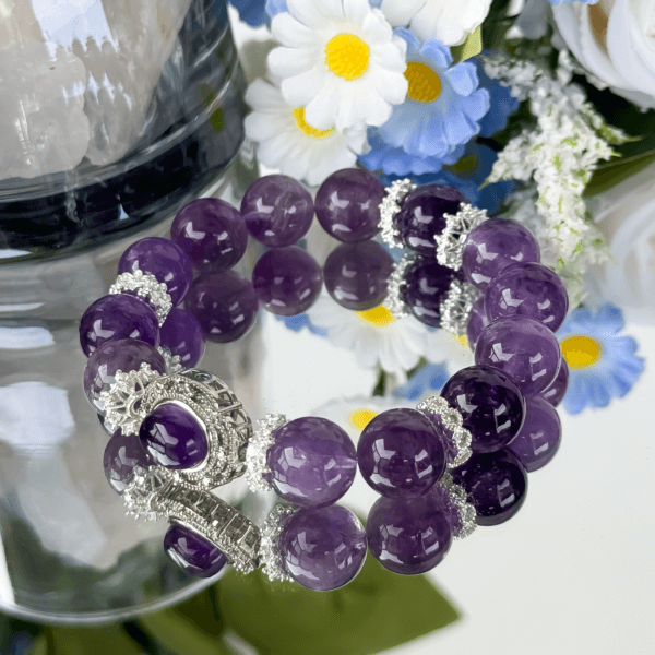 Icy Amethyst crystal bead bracelet with intricate silver centerpiece