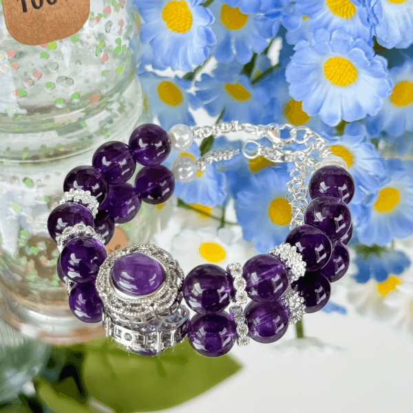 Uruguayan Amethyst Crystal Bead Bracelet with Flower Background