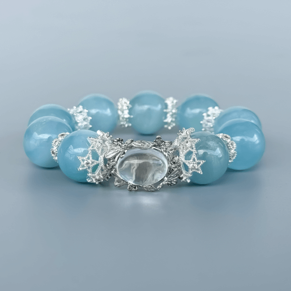 Aquamarine Crystal Bead Bracelet with Silver Accents on Display