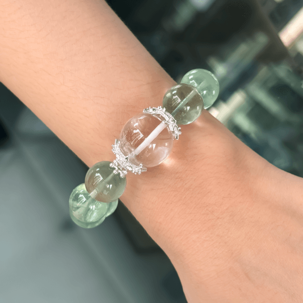 Green Fluorite Bracelet on wrist with clear center bead
