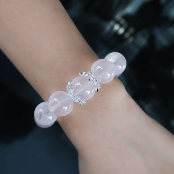 Madagascar Rose Quartz crystal bracelet worn on wrist