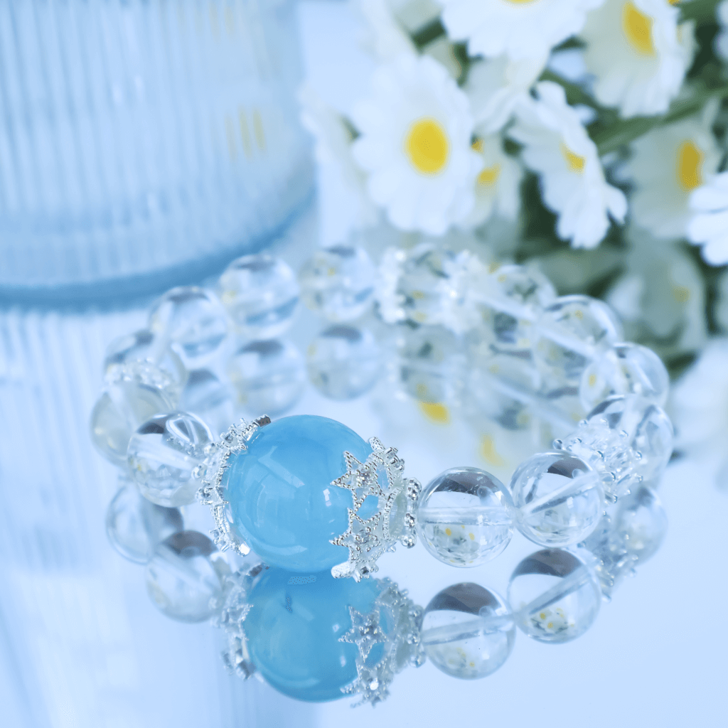 Clear Quartz Bead Bracelet with Aquamarine and Floral Accents