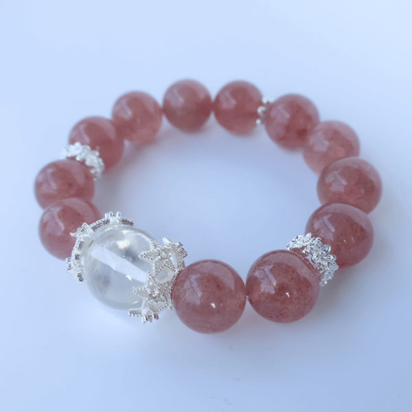 Strawberry Quartz crystal bead bracelet close-up view