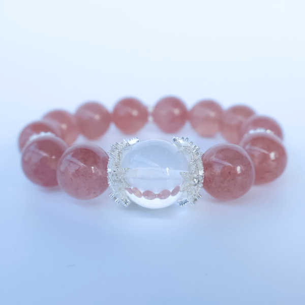 Strawberry Quartz crystal bead bracelet close-up view