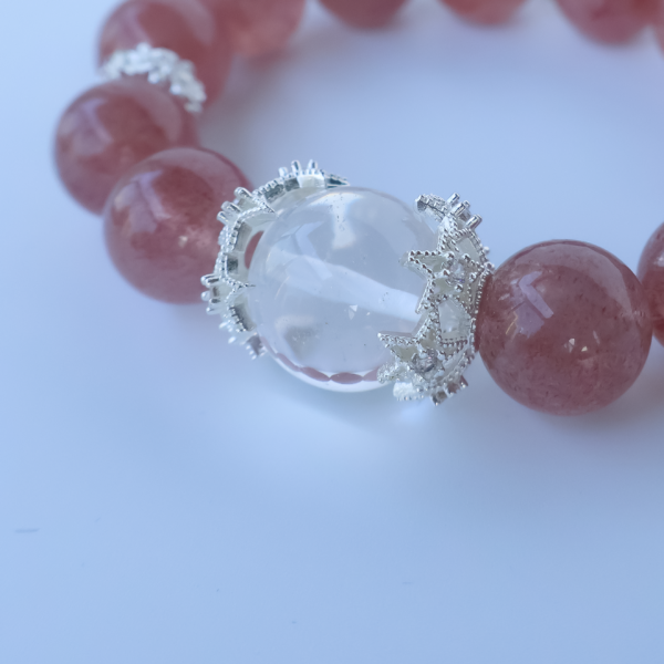 Strawberry Quartz crystal bead bracelet close-up view
