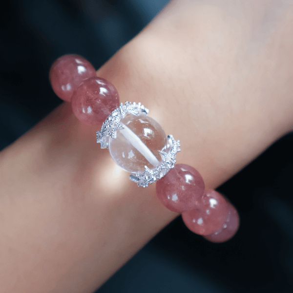 Strawberry Quartz crystal bracelet worn on wrist