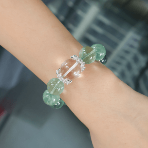 Green Fluorite Bracelet with Central Clear Bead Worn on Wrist