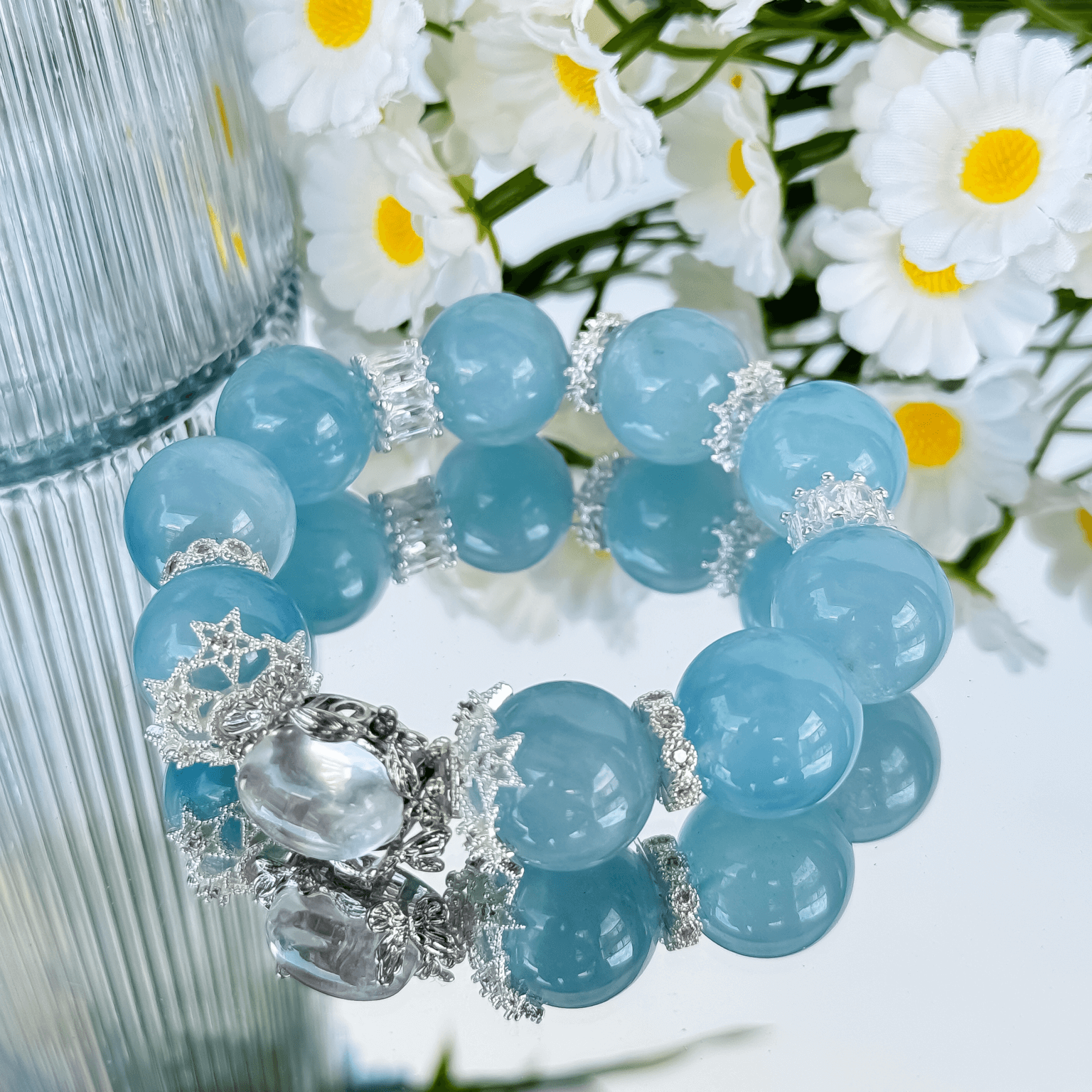 Aquamarine Crystal Bead Bracelet with Floral Background