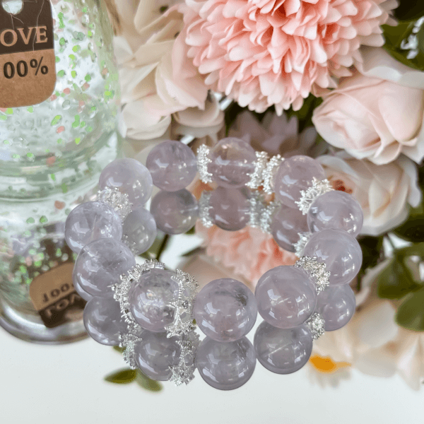 Purple Rabbit Hair Crystal Bead Bracelet with Floral Background