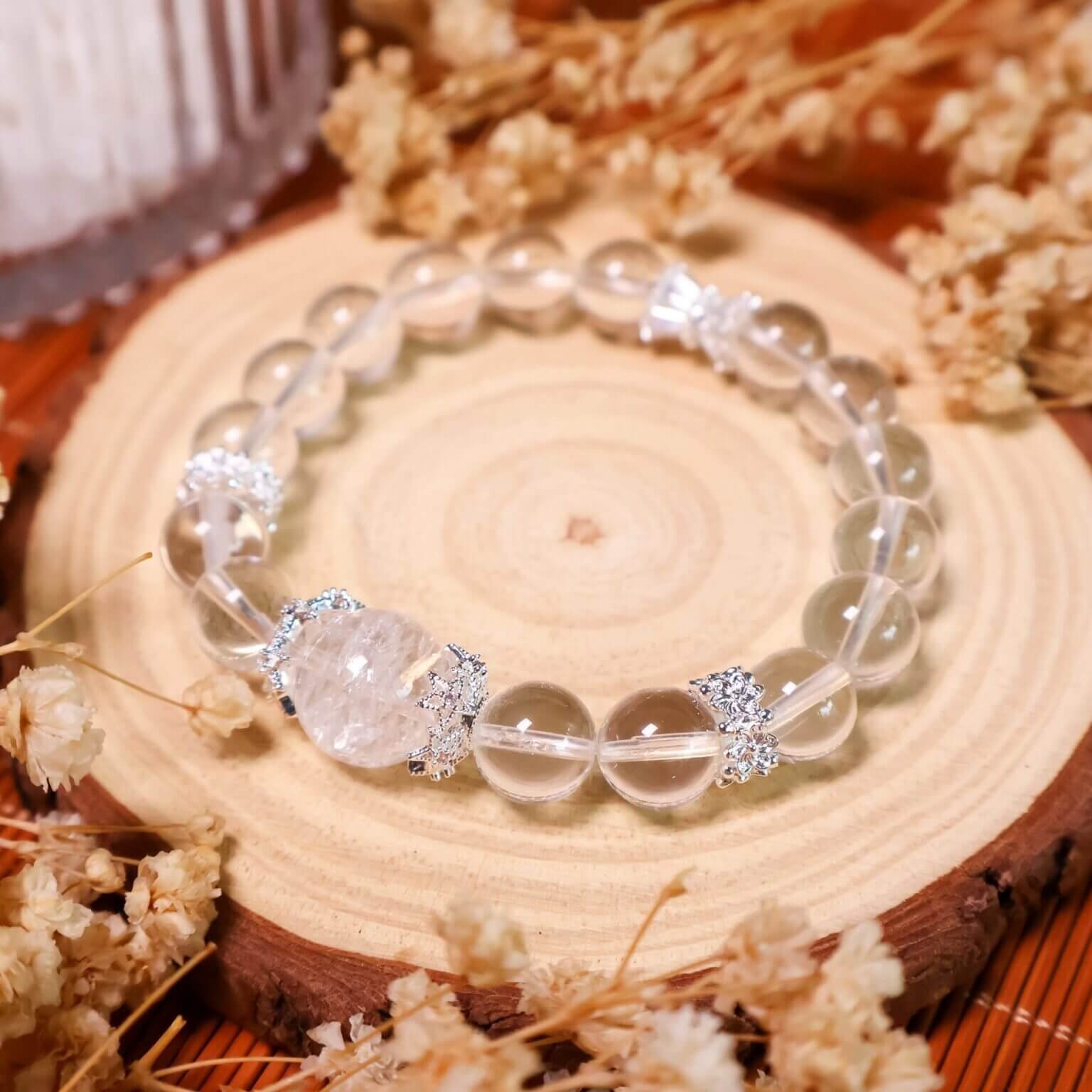 Clear Quartz Bracelet Displayed on Wooden Background