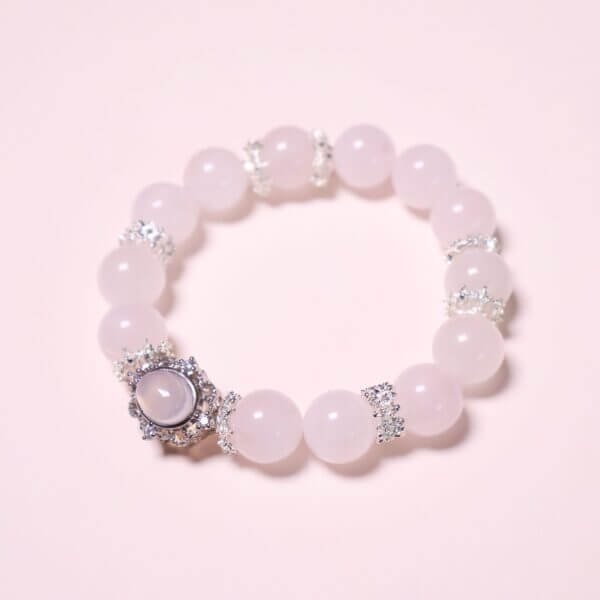 Handmade pink crystal bracelet with silver crown centerpiece and 12mm beads