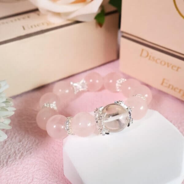 Handmade pink ocean rose quartz bracelet with silver accents