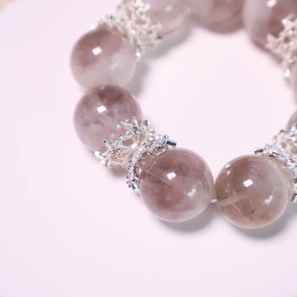 Close-up of Purple Rabbit Hair Quartz Beads