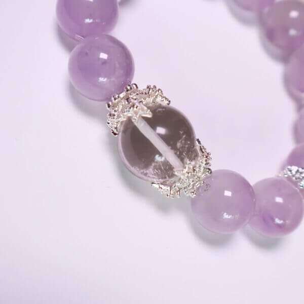 Handmade Lavender Amethyst Crystal Bracelet on White Display