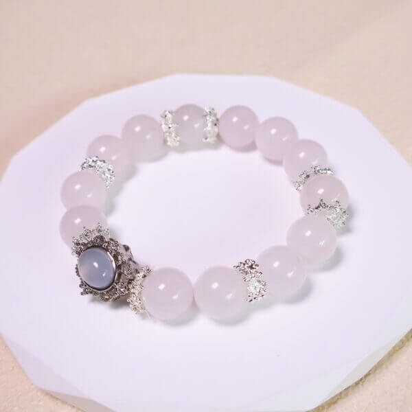 Handmade pink crystal bracelet with silver crown centerpiece and 12mm beads