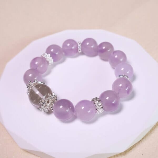 Handmade Lavender Amethyst Crystal Bracelet on White Display