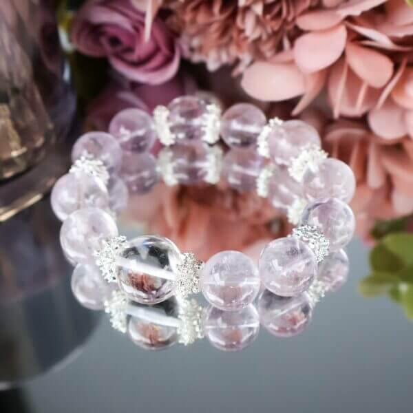 Elegant Lavender Amethyst Bracelet on Floral Background