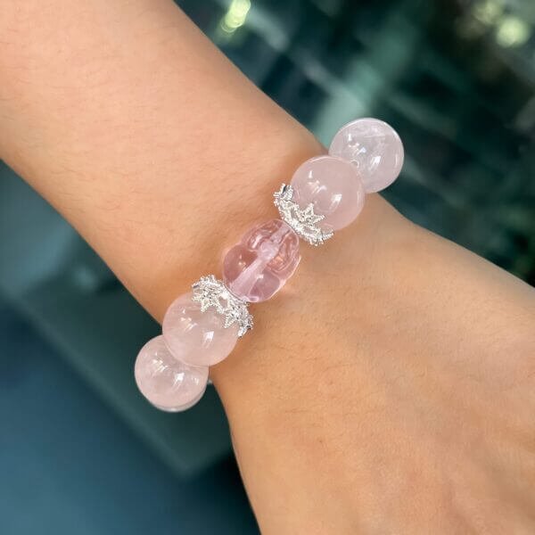 Pink Assai Crystal Bead Bracelet on Wrist with Crystal Charm